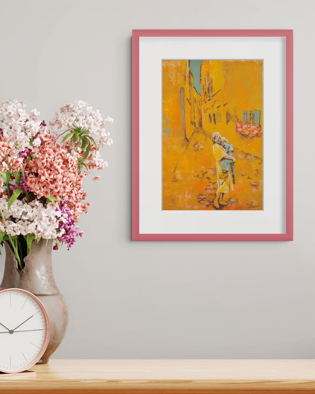 sommerlig print i gult av en god klem, i rosa ramme